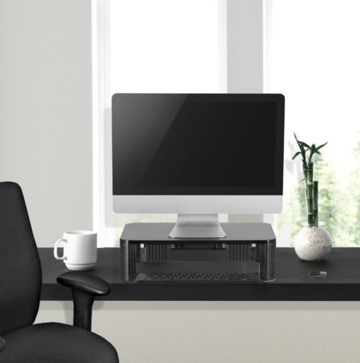 Monitor stand placed on a desk